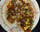 A picture of step 4 of Chicken tikka pizza.