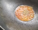 A picture of step 3 of Kaale masale mein baigaan.