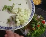 A picture of step 1 of Papdi pizza with salsa topping.