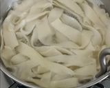A picture of step 4 of Homemade capsicum Fattuccine pasta.