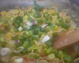 A picture of step 7 of Cheesy vegetable maggi.