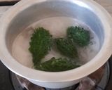 A picture of step 1 of Bitter Gourd Green Mango Curry.