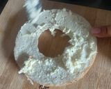 A picture of step 2 of Cream Cheese And Fruit Bagels.
