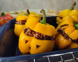 Foto del paso 7 de la receta: Pimientos rellenos de pollo y arroz negro, especial Halloween