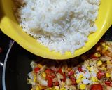 A picture of step 5 of Thai style fried rice with vegetables and tofu.