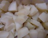A picture of step 1 of Alu peethi (Potato filling).