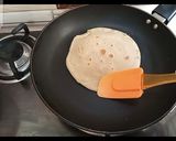 A picture of step 6 of Roti\Chapati \Phulka with liquid dough.