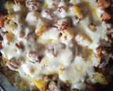 Foto del paso 4 de la receta: Carne con papas, cebolla y muzarella al horno