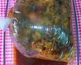 Foto del paso 6 de la receta: Pollo asado en bolsa al horno en reducción de sus propios juegos