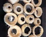 A picture of step 3 of Parmesan breaded onion rings.