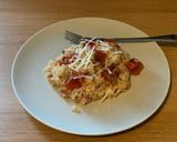 A picture of step 4 of Oven baked risotto with bacon and tomatoes.