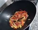 Foto del paso 4 de la receta: Cerdo salteado! ✨