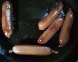 A picture of step 2 of Smokies for breakfast.