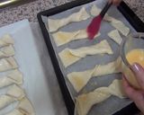 Foto del paso 4 de la receta: Lazos de hojaldre, miel y almendra