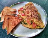 A picture of step 5 of Masala Omelette.