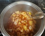 Foto del paso 3 de la receta Arroz meloso con tómate frito y bacalao