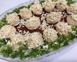 Foto del paso 5 de la receta: Huevos rellenos con base de tomate frito casero