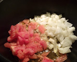 Foto del paso 4 de la receta: Chipirones con guisantes