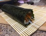 A picture of step 8 of Kimchi Avocado Sushi.