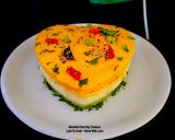A picture of step 8 of Heart Shaped 3 Layers Tricolor Dhokla Savory Cake - 80th Independence Day Special.
