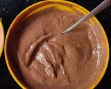 A picture of step 2 of Vanilla cake with chocolate ganache.