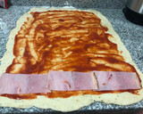 Foto del paso 3 de la receta: Rollitos de jamón y queso al horno