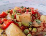 A picture of step 4 of Aloo Matar gajar.