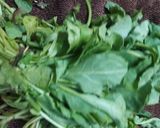 A picture of step 1 of Kerala style palak thoran.