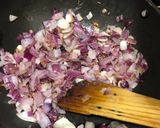 A picture of step 2 of Rajasthani Papad Pyaz in gravy.