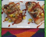 वेजिटेबल गार्लिक ब्रेड पिज्जा (Vegetable garlic bread pizza recipe in Hindi) रेसिपी चरण 10 फोटो