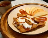 A picture of step 11 of WALNUT APPLE PARATHA WITH CARAMEL SAUCE & VANILLA ICE-CREAM.