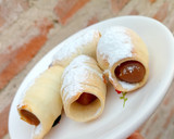 Foto del paso 3 de la receta: Cañoncitos de pascualina exprés