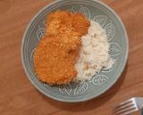 Foto del paso 4 de la receta: Milanesas de pollo rebozadas en copos de maíz