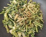 A picture of step 3 of Calzones with Wild Dandelion Greens, Black Olives, and Almonds.