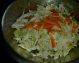 A picture of step 3 of Stir fry cabbage and carrot.