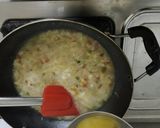 A picture of step 2 of Egg drop soup.