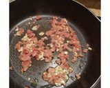 Foto del paso 2 de la receta Guisantes salteados con un sofrito de jamón serrano y ajo