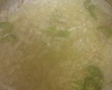 A picture of step 4 of Stuffed green moong dal cheela with paneer burji & cheese.