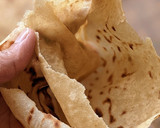 A picture of step 5 of Layered Chapatis with tea.