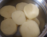 Foto del paso 3 de la receta: Patatas aliñadas con langostinos