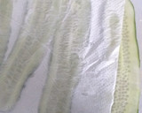 A picture of step 4 of Three coloured Cucumber Roll's Up.