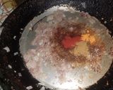 A picture of step 2 of Anda Bhurji.