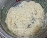 A picture of step 1 of Nolen gurer payes/Rice kheer with date jaggery.