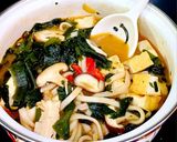 A picture of step 3 of Banh Canh with Mushrooms, Tofu, and Seaweed.