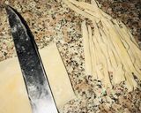 A picture of step 8 of Homemade egg pasta with shredded chicken sauce.