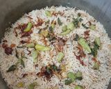 A picture of step 9 of Chicken yakhni pulao.