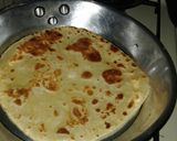 A picture of step 8 of Coconut chicken and soft layerd chapati.