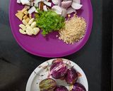 A picture of step 1 of Stuffed brinjal masala.