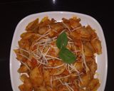A picture of step 6 of Conchiglie Pasta in red sauce.