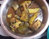 A picture of step 1 of Aloo begun  borboti  shorshe hilsa.